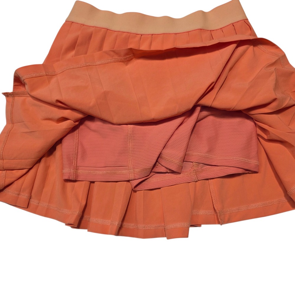 Athleta Girl Orange Pleated Tennis Skirt Built-in Shorts Kids Size L 12 - Picture 5 of 8